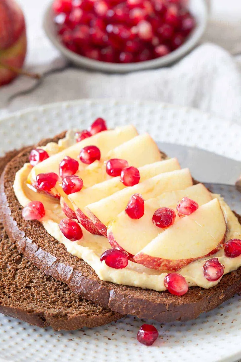 Apple Pomegranate Hummus Toast