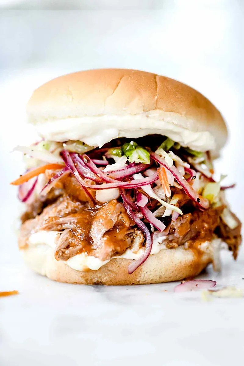 Slow Cooker Pulled Pork with buns and rolls