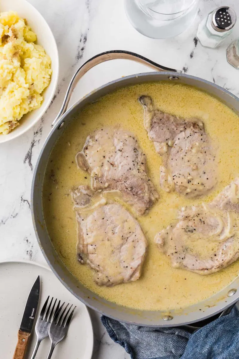 Smothered Pork Chops with heavy cream