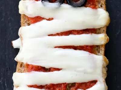 French Bread Pizza Mummies