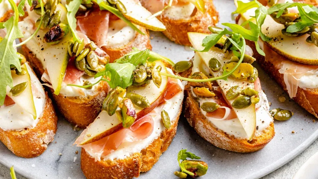 Ricotta Pear Crostini with Seed Crunch