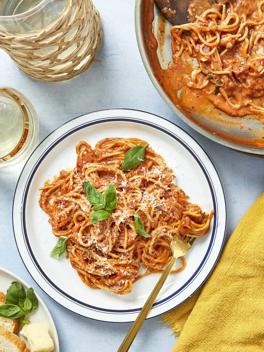 Creamy Tomato Pasta with fresh herbs (cilantro