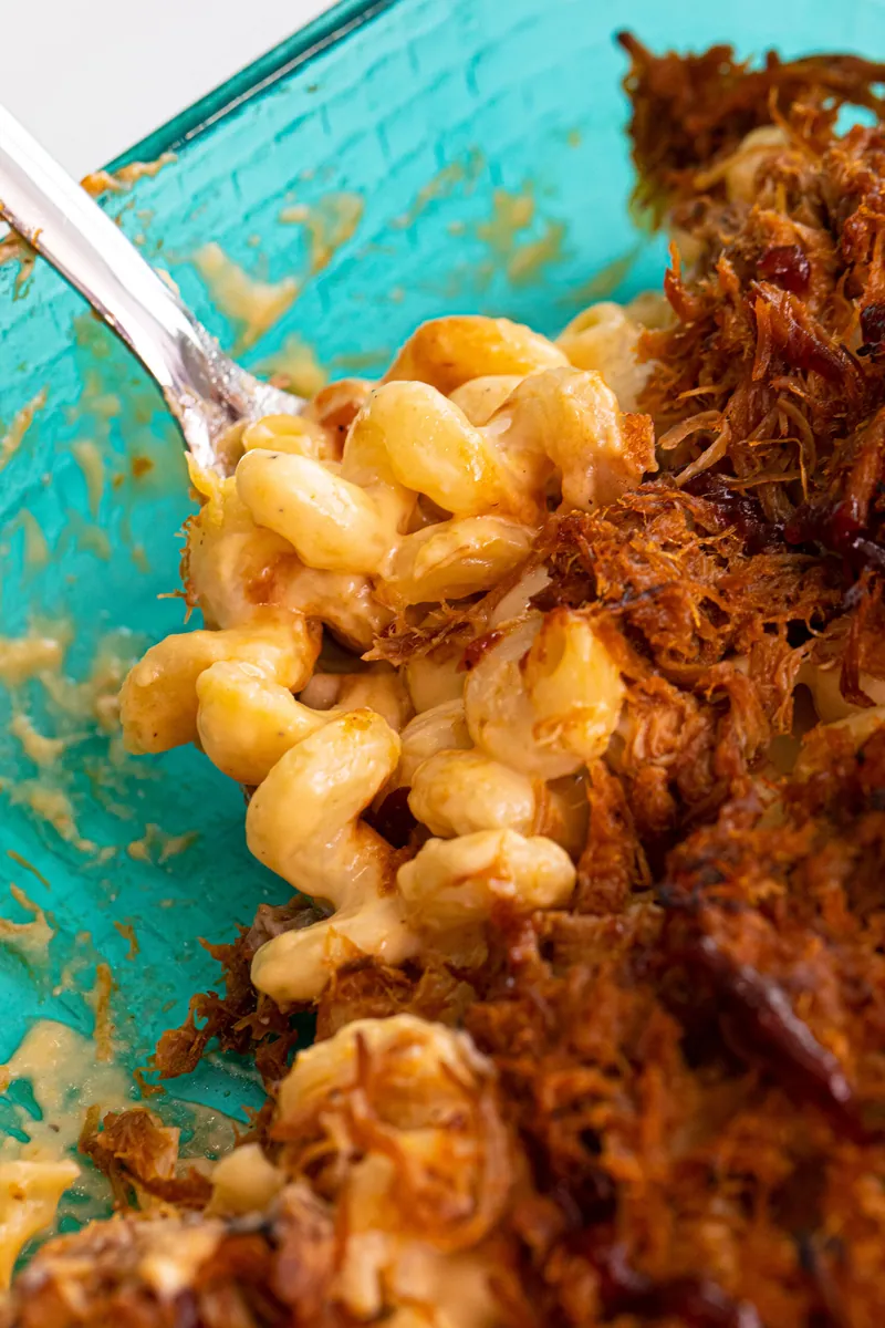 Pulled Pork Mac and Cheese with cheddar and shredded cheese