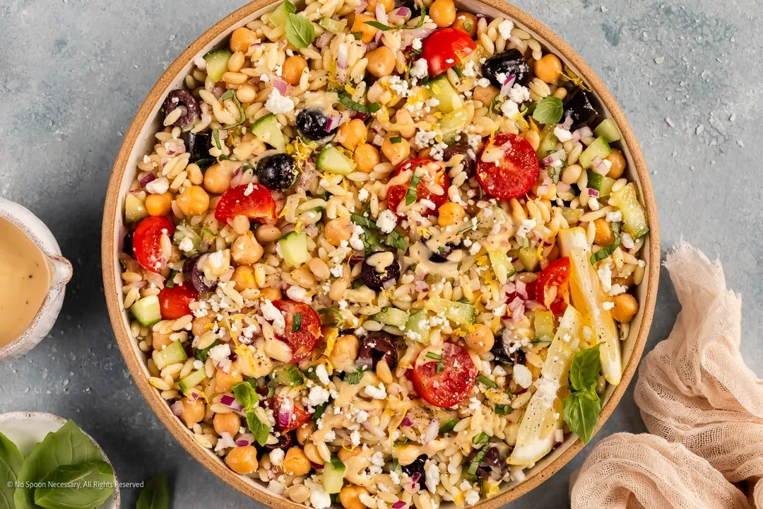 Greek Orzo Pasta Salad with cherry and grape tomatoes