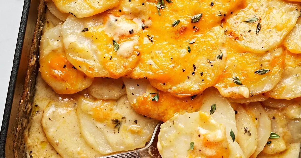 Cheddar Scalloped Potatoes with butter